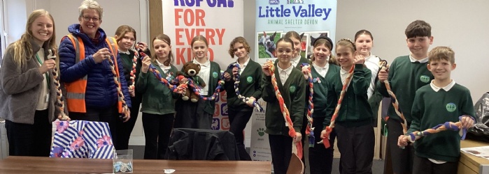 pupils-with-the-toys-they-made-for-dogs-at-little-valley-animal-shelter